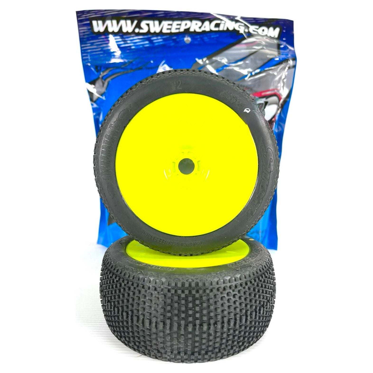 SWEEP Defender-T Yellow  X (Super Soft) 1/8 Truggy Tyres with Yellow wheels and inserts, mounted / unglued.