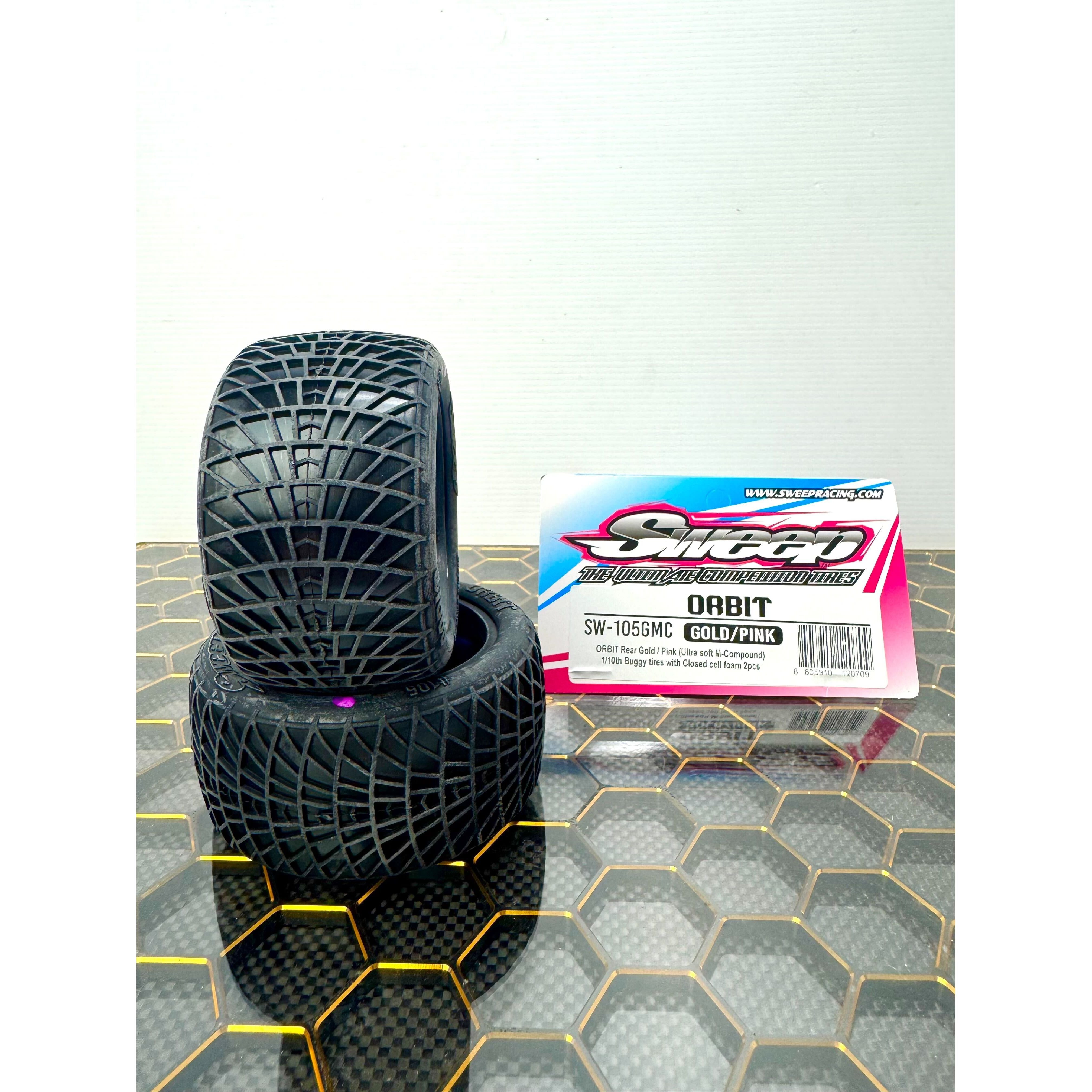 SWEEP 1/10 Buggy Tyres Orbit Rear Gold/Magenta (Clay Ultra Soft) with closed cell inserts.