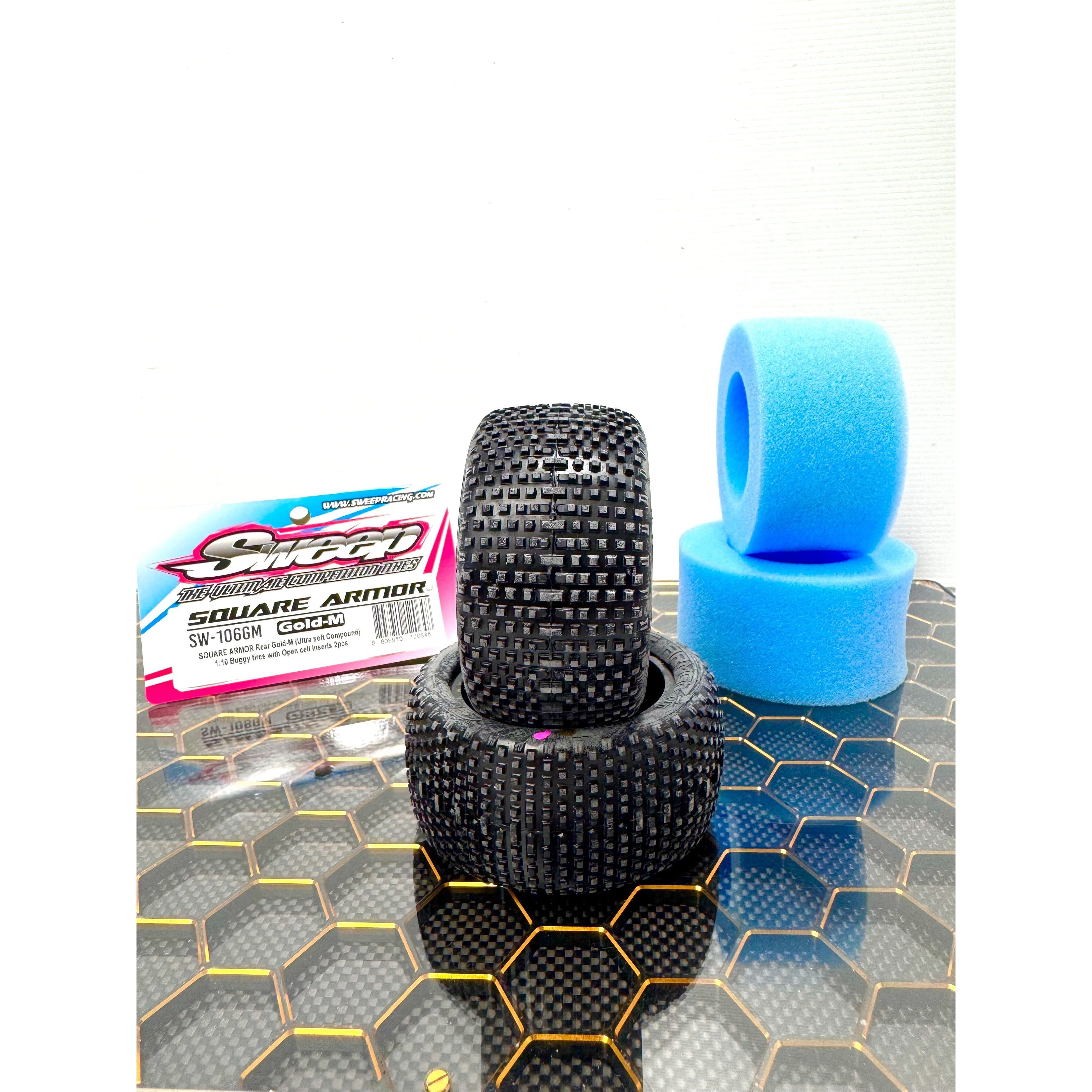 SWEEP 1/10 2.2 Buggy Rear Tyres Square Armour Gold Magenta (Clay Ultra Soft Compound) with open cell inserts.