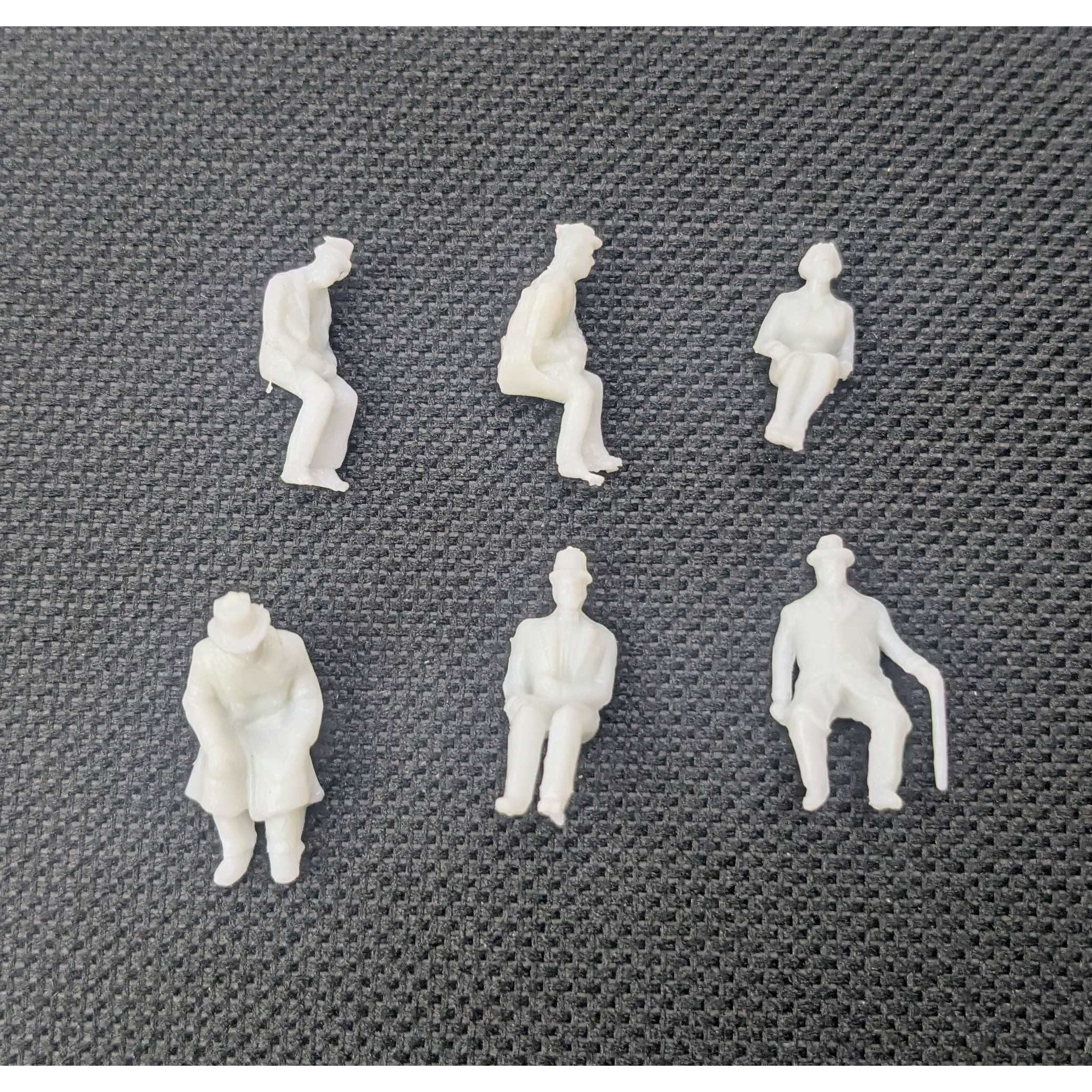 Hearns Hobbies HO Unpainted Assorted Figures Sitting