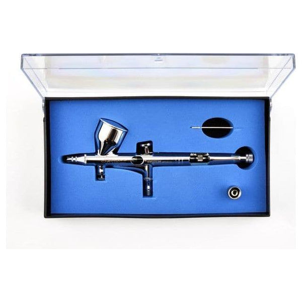 [SUGGESTED IMAGE: Split image showing basic brush painting techniques on one side (basecoat, wash, drybrush) and airbrush techniques on the other (priming, base coating, pre-shading)]